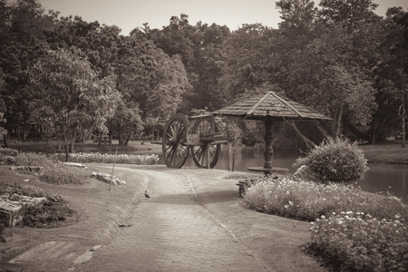 Thai Vintage Wooden Cart & Traditional hutsの写真素材