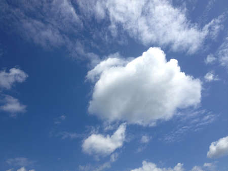 a bright blue sky with light cloudsの素材