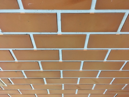 Texture of orange brick wall, Oblique view