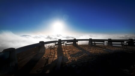 Sunrise and Inversion at Jested mountain close town Liberec, Czech republic, snow and winter and view of funicular.の写真素材