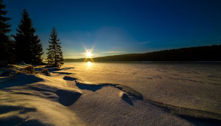 Cerna Nisa dam near Bedrichov city in Jizera Mountains, Czech Republic, winter and frost.の写真素材