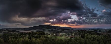 sunrise sunset over Kozakov mountain from Dubecko lookout tower, the best photoの写真素材