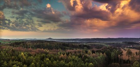sunrise sunset over castle Trosky from Dubecko lookout tower, the best photoの写真素材