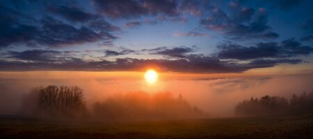 sunrise sunset from mountain Kozakov in inversion, the best photoの写真素材