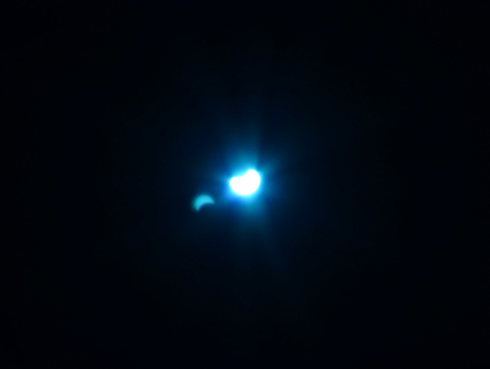 Photo of the eclipsed sun photographed through a filter