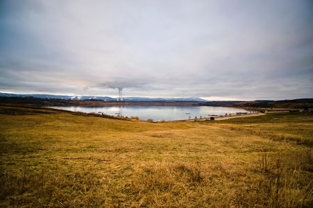 Most, Czech republic - January 24, 2022: lake Most and Ore mountains at eveningのeditorial素材