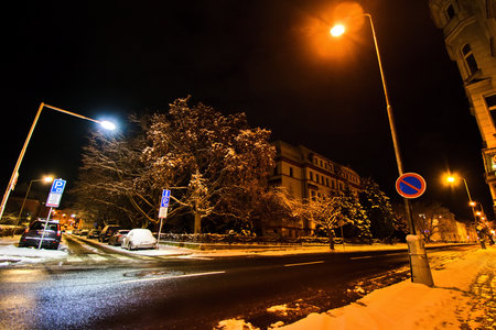 Chomutov, Czech republic - January 09, 2022: Skolni street with industrial secondary school at night in snowy winterのeditorial素材