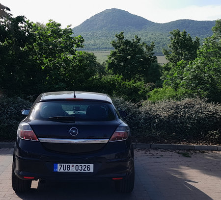 Lovosice, Czechia - May 24, 2023: view of Lovos hill from parking place in cityのeditorial素材
