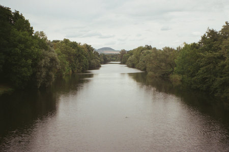view of Ohre river in Bohusovice nad Ohri on 31 July 2023 in an analogue photo