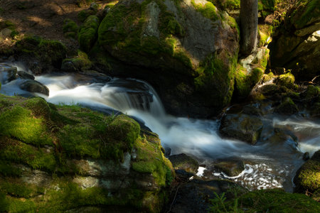 The only waterfall on the Czech side of the Bohemian Forest is very modest in height - only 1.5 meters. However, the flow of 350 liters is impressive.の写真素材