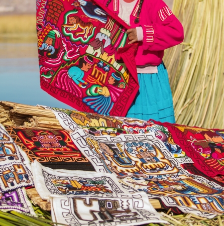 Woman selling souvenirs in Uros, Peru, Bolivia