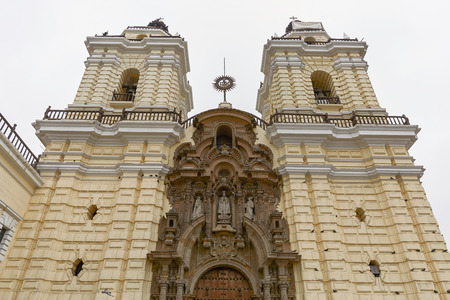 Monastery of San Francisco in Lima, Peru. The church contains a museum and catacombs which are popular place to visit by tourists.のeditorial素材
