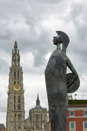 Statue and cathedral in Antwerp in Belgium.のeditorial素材