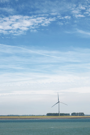 Windmill in Belgium for production of green energy.の写真素材