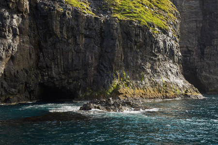 Wild and rocky coast of Faroe Islands, Denmark.の写真素材