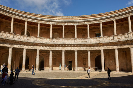 People visiting courtyard in Palacio de Carlos V in La Alhambra, Granada, Spainのeditorial素材
