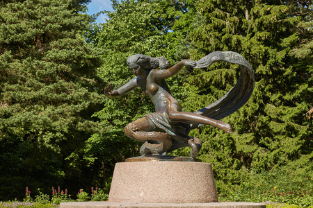 PALANGA, LITHUANIA - JULY 05, 2017: Statue and beautiful Palanga Amber Museum in Tiskeviciai Palace and Botanical Garden in Palanga, Lithuania.のeditorial素材