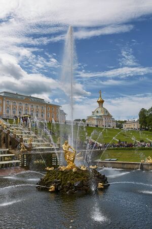People visiting famous landmark of Peterhof, close to city of St. Petersburg in Russia and enjoying sunny summer day.のeditorial素材