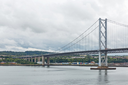 Older Forth Road bridge in Edinburgh Scotlandの写真素材
