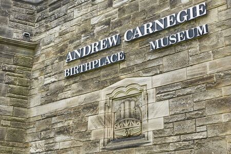 DUNFERMLINE, SCOTLAND - AUGUST 02, 2017: Sign of the Andrew Carnegie museum in Dunfermline, Scotlandのeditorial素材