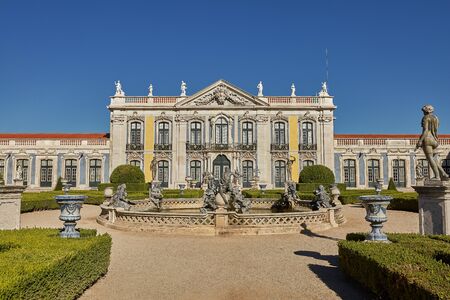 QUELUZ, SINTRA / PORTUGAL - OCOBER 02, 2017: Facade, fountain and gardens of Queluz Palace in Sintra, Portugal during summer dayのeditorial素材