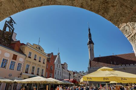 TALLINN, ESTONIA - JULY 07, 2017: Tourists crowd enjoying shopping at the medieval Town Square in the walled city of Tallinn Estoniaのeditorial素材