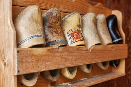 ZAANSE SCHANS, NETHERLANDS - JULY 01, 2017: Colorful vintage hand painted wooden Dutch Clogs at Zaanse Schans, close to Amsterdam in Netherlands.のeditorial素材