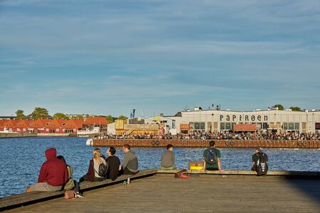 COPENHAGEN, DENMARK - MAY 25, 2017: Street food market Papiroen on the paper island in Copenhagen with a lot of people on the quay.のeditorial素材
