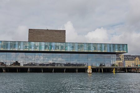 COPENHAGEN, DENMARK - MAY 25, 2017: Modern building of the New Royal Playhouse Theater in historic city center facing famous Copenhagen waterfront, Nyhavn, Denmark.のeditorial素材