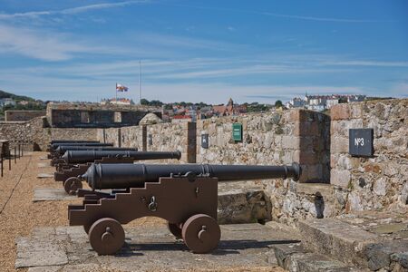 ST. PETER PORT, GUERNSEY, UK - AUGUST 16, 2017: Traversing Carriage Cannon at Castle Cornet in St Peter Port, Guernsey, UK.のeditorial素材