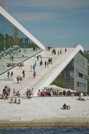 OSLO, NORWAY - MAY 27, 2017: Oslo Opera House (Operahuset) is home of Norwegian National Opera and...