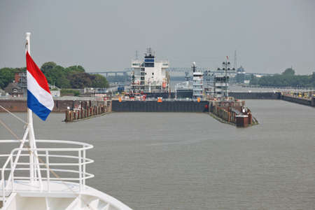 Kiel, Germany - May 23, 2017: Cruise ship passes the Holtenau lock of the Kiel Canal to continue their journey to the Baltic Seaのeditorial素材