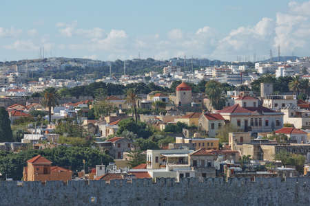 RHODES, GREECE - OCTOBER 26, 2017: Marine Gate and the fortifications of the Old Town of Rhodes, view from Mandraki harbour, Rhodes, Greeceのeditorial素材