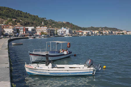 Zakynthos, Greece - October 17, 2017: Docked boats alongside the port on island of Zakynthos in Greece.のeditorial素材