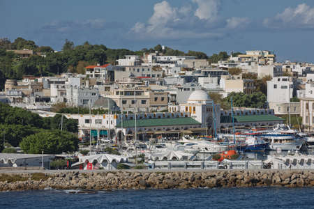 RHODES, GREECE - OCTOBER 26, 2017: Marine Gate and the fortifications of the Old Town of Rhodes, view from Mandraki harbour, Rhodes, Greeceのeditorial素材