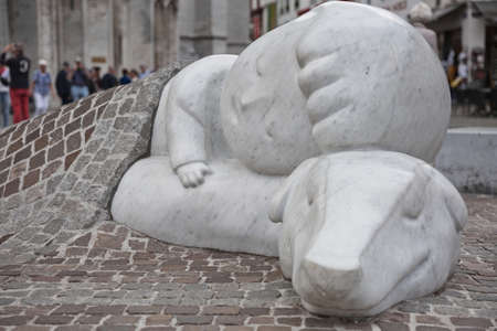 Antwerp, Belgium - June 16, 2017: A boy and his dog sculpture in Antwerp to honour the famous book A Dog of Flanders written by British author and animal rights activist Marie Louise de la RamÃ©e Ouidaのeditorial素材