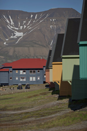 Traditional colorful wooden houses on a sunny day in Longyearbyen Svalbard.の写真素材