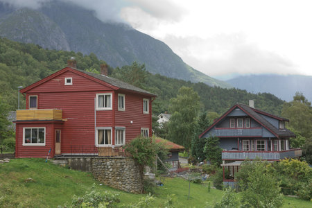 The village of Eidfjord in Norway is a major cruise ship port of call. It is situated at the end of the Eid Fjord, an inner branch of the large Hardangerfjorden.の写真素材