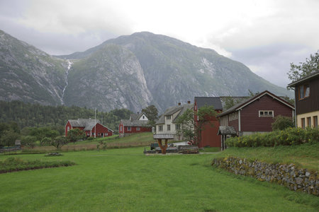 The village of Eidfjord in Norway is a major cruise ship port of call. It is situated at the end of the Eid Fjord, an inner branch of the large Hardangerfjorden.の写真素材