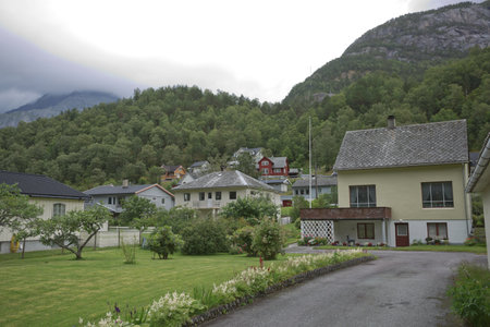 The village of Eidfjord in Norway is a major cruise ship port of call. It is situated at the end of the Eid Fjord, an inner branch of the large Hardangerfjorden.の写真素材