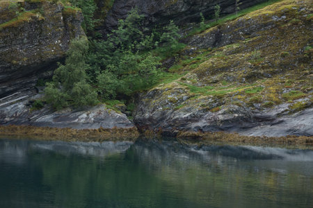 Geiranger fjord, Beautiful Nature Norway. It is a 15-kilometre (9.3 mi) long branch off of the Sunnylvsfjorden, which is a branch off of the Storfjorden (Great Fjord).の写真素材