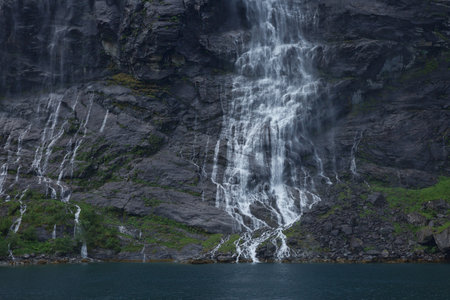 The seven sisters waterfall over Geirangerfjord, located near the Geiranger village, Norway.の写真素材