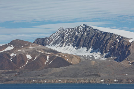 Mountains, glaciers and coastline landscape close to a village called "Ny-Ãlesund" located at 79 degree North on Spitsbergen.の写真素材
