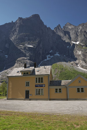 Rauma, Norway - July 19, 2017: Rauma Railway Station, an historic wooden building, on the famous scenic railway, below the Troll Wall in Rauma Municipality, More Og Romsdal, Norwayのeditorial素材