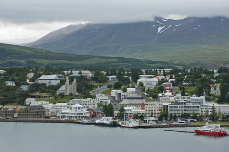 Akureyri, Iceland - July 27, 2017: View of a city center and Akureyrarkirkja church in Akureyri in Iceland.のeditorial素材