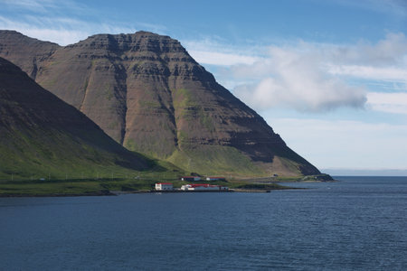 Beautiful view and landscape of icelandic fjord that is surrounding village of Isafjordur in Iceland.の写真素材