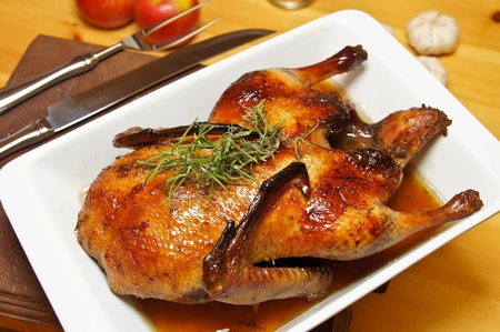 baked duck with rosemaryの写真素材