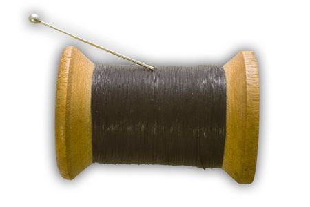 black thread on a spool 
