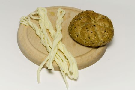 Cheese on wood plate