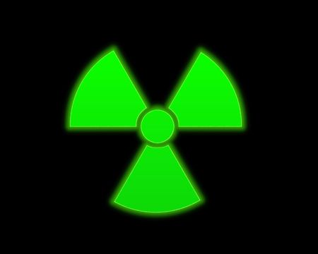 the green radioactive symbol on black backgroundの写真素材